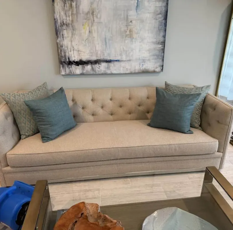 Beige upholstered sofa after professional cleaning