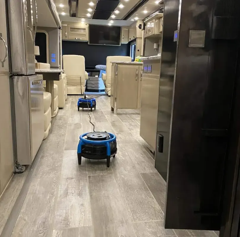Tile and grout flooring inside a motorcoach drying after cleaning