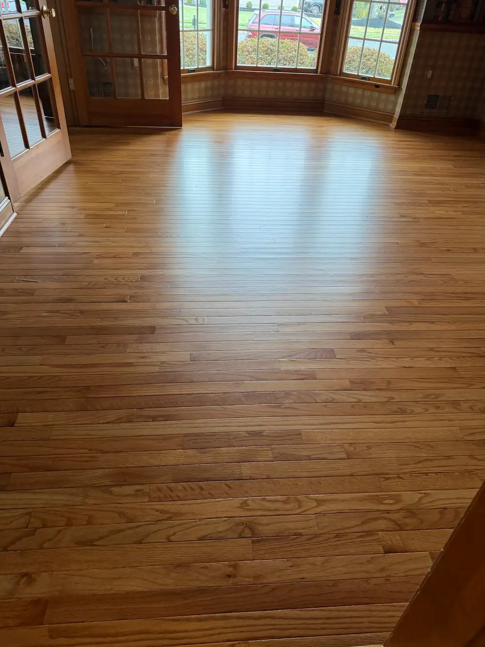 Oak hardwood floor after a screen and recoat in a Monmouth County, NJ home