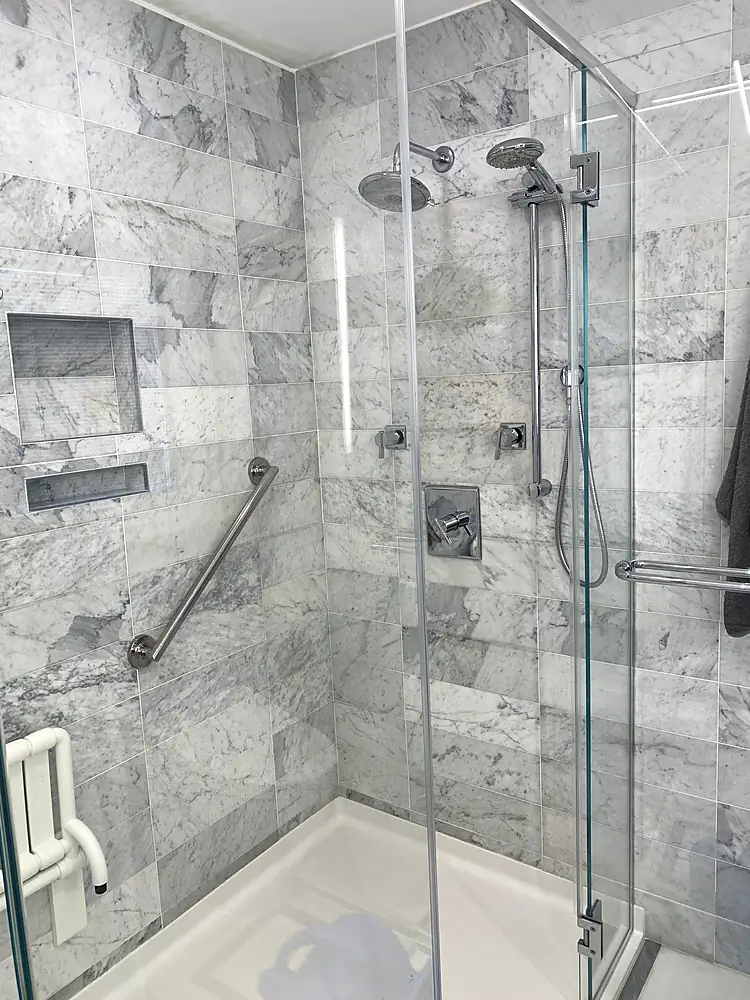 Marble shower walls and floor after natural stone cleaning