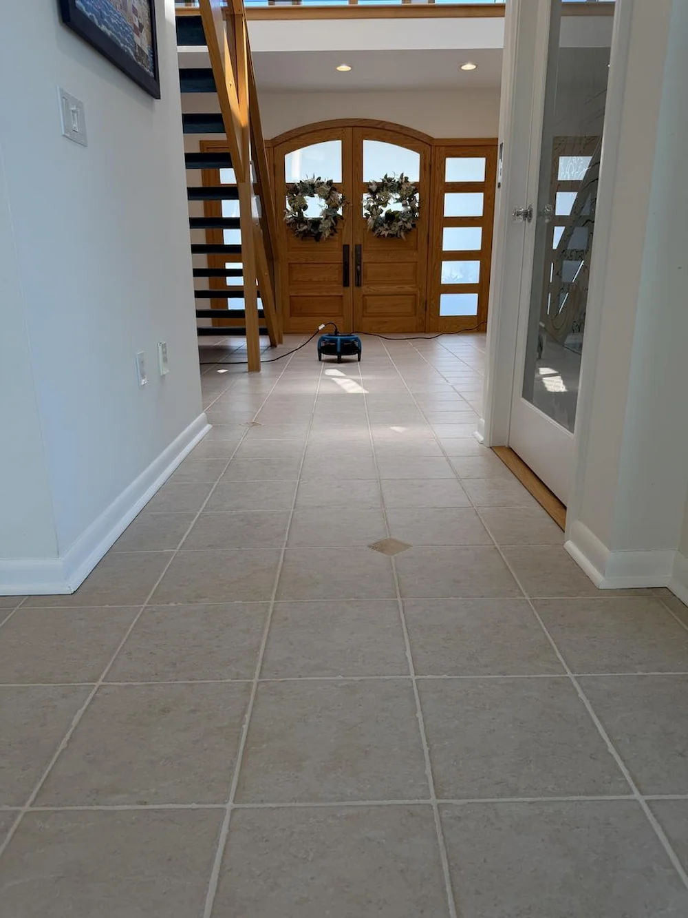 Large tile entryway drying with an air mover after tile and grout cleaning in a Monmouth County, NJ home