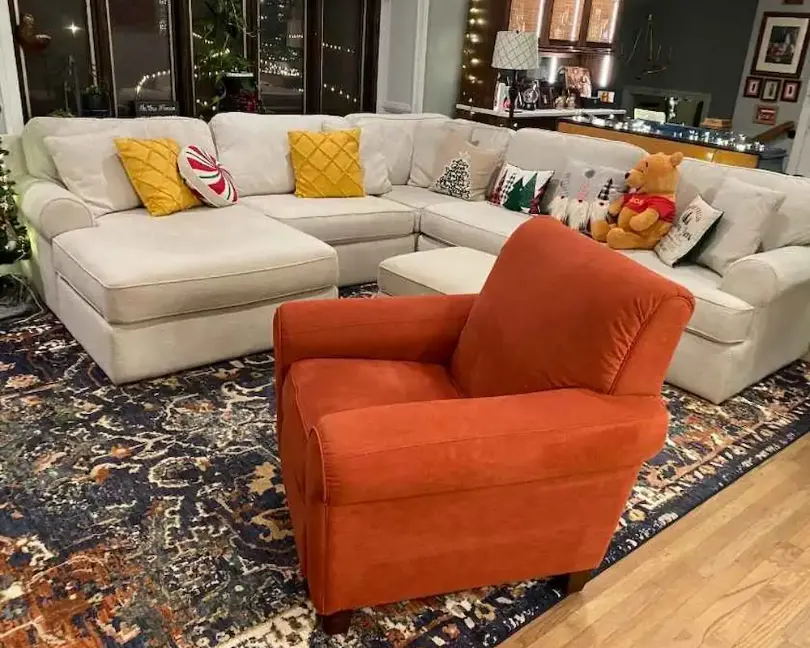 Upholstery cleaning for a sectional and armchair in a Monmouth County, NJ living room